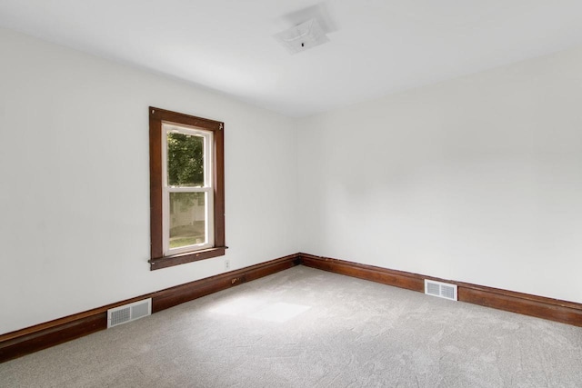 215 W Burns St, Portage, WI 53901 - carpeted spare room with baseboards
