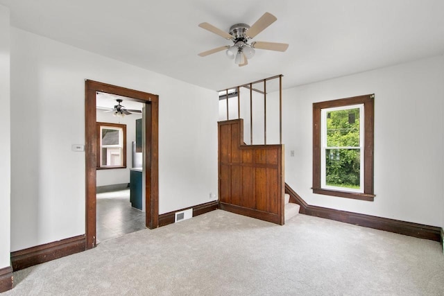 215 W Burns St, Portage, WI 53901 - carpeted spare room with a ceiling fan