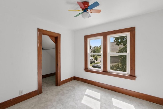 215 W Burns St, Portage, WI 53901 - empty room featuring light colored carpet and ceiling fan