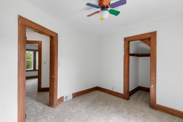 215 W Burns St, Portage, WI 53901 - unfurnished room featuring light carpet and a ceiling fan