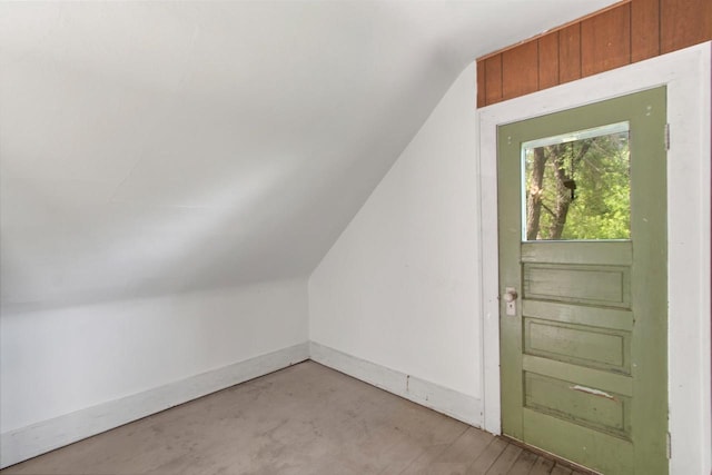 215 W Burns St, Portage, WI 53901 - bonus room featuring lofted ceiling and baseboards