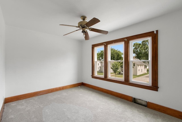 215 W Burns St, Portage, WI 53901 - empty room with carpet and a ceiling fan