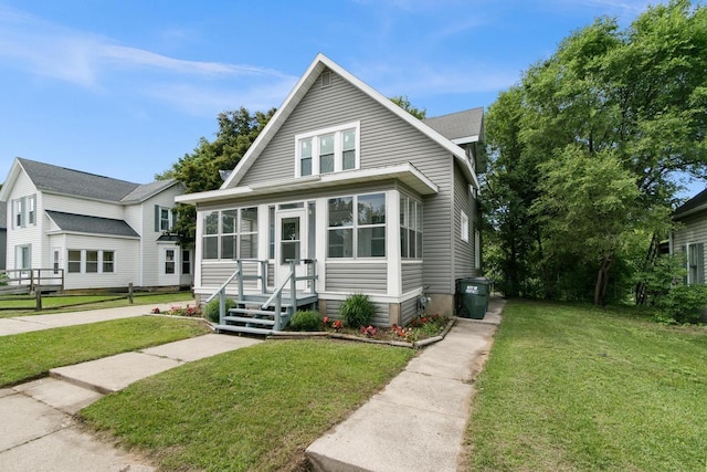 215 W Burns St, Portage, WI 53901 - bungalow-style home with a front lawn