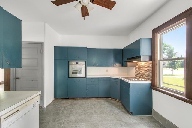 215 W Burns St, Portage, WI 53901 - kitchen with wall oven, ceiling fan, and blue cabinets