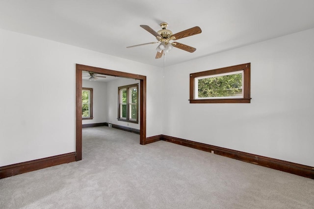 215 W Burns St, Portage, WI 53901 - empty room with light colored carpet and a ceiling fan