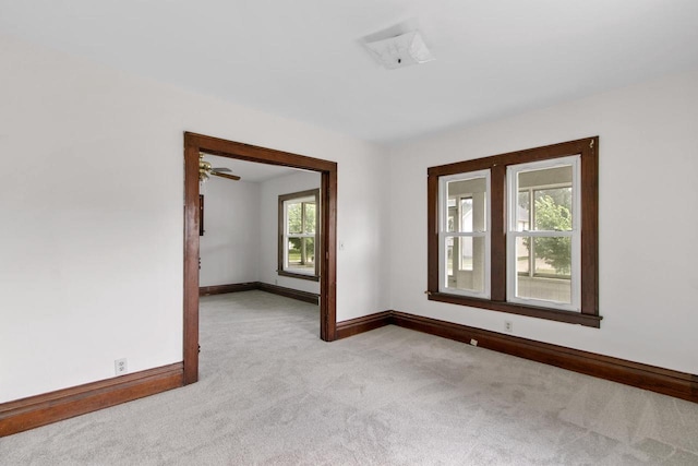 215 W Burns St, Portage, WI 53901 - spare room with light carpet and baseboards