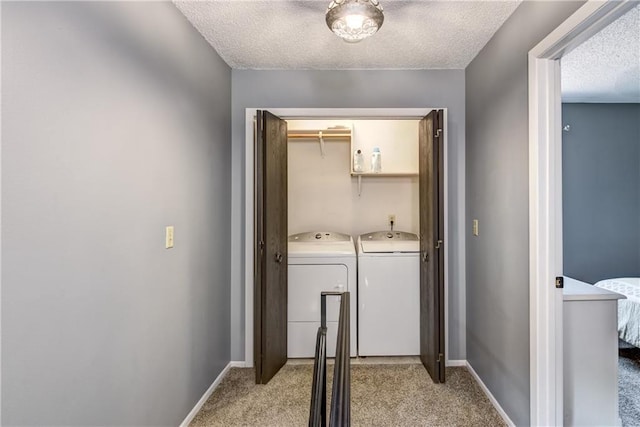 45 Stump Lake Rd Unit 6, Chippewa Falls, WI 54729 - laundry room with separate washer and dryer, light carpet, and a textured ceiling
