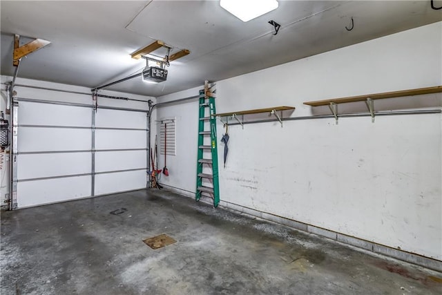 45 Stump Lake Rd Unit 6, Chippewa Falls, WI 54729 - garage featuring a garage door opener