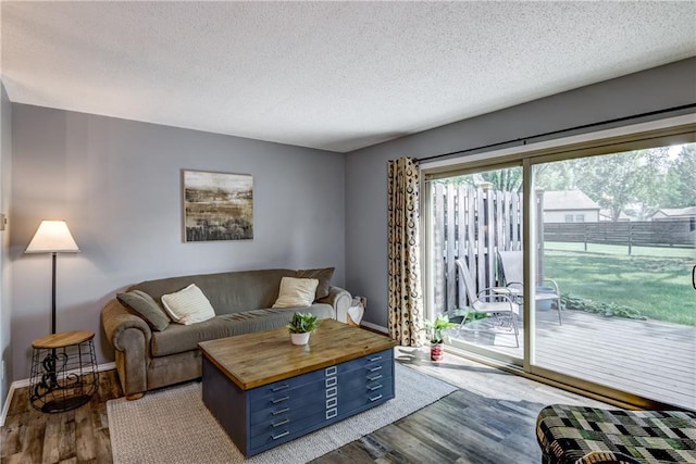 45 Stump Lake Rd Unit 6, Chippewa Falls, WI 54729 - living area featuring wood finished floors and a textured ceiling