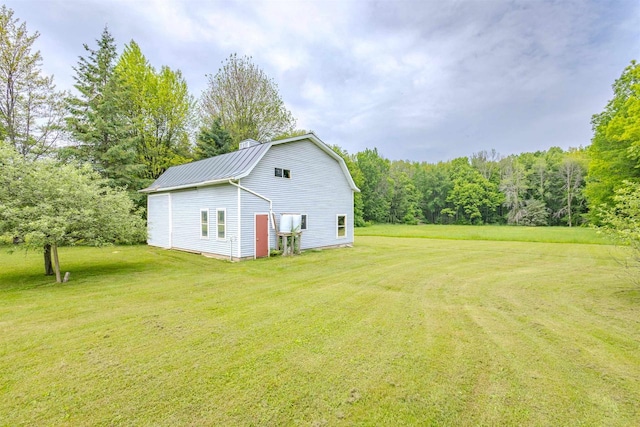 7040 Blonien Ave, Rudolph, WI 54475 - view of grassy yard featuring a wooded view