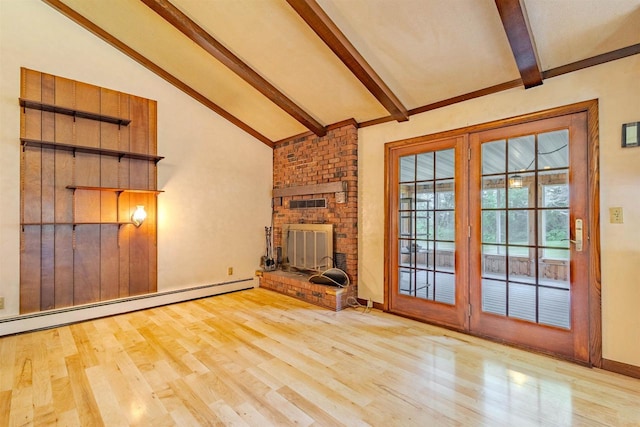 7040 Blonien Ave, Rudolph, WI 54475 - unfurnished living room featuring wood finished floors, a brick fireplace, and baseboard heating