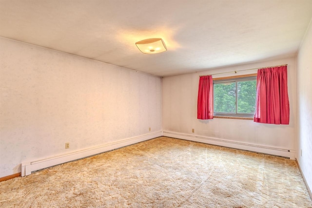 7040 Blonien Ave, Rudolph, WI 54475 - empty room with baseboard heating and carpet flooring