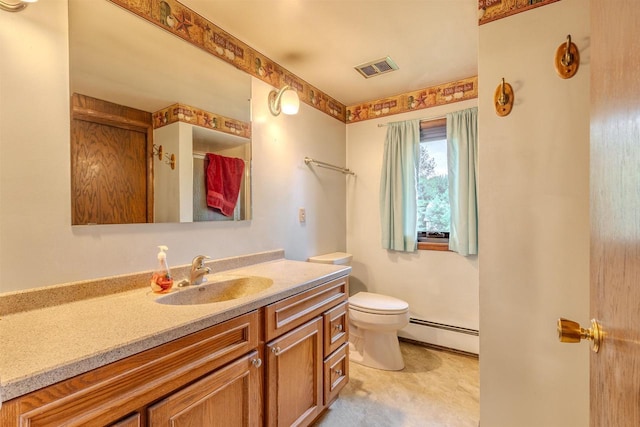 7040 Blonien Ave, Rudolph, WI 54475 - bathroom featuring baseboard heating and vanity