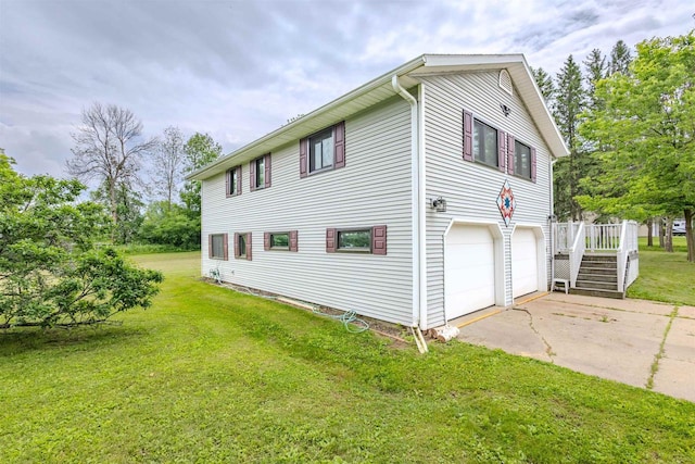 7040 Blonien Ave, Rudolph, WI 54475 - view of home's exterior with driveway, a garage, a yard, and a deck