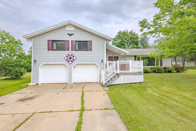 7040 Blonien Ave, Rudolph, WI 54475 - split level home featuring a front yard, an attached garage, driveway, and covered porch