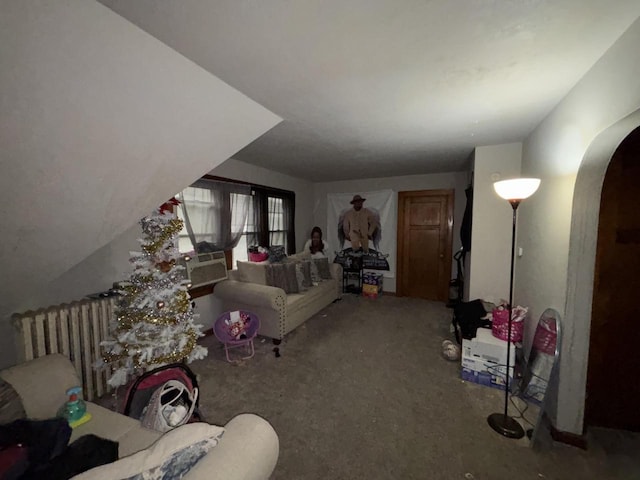 3350 N 25th St Unit 3350A, Milwaukee, WI 53206 - carpeted living area with arched walkways and radiator