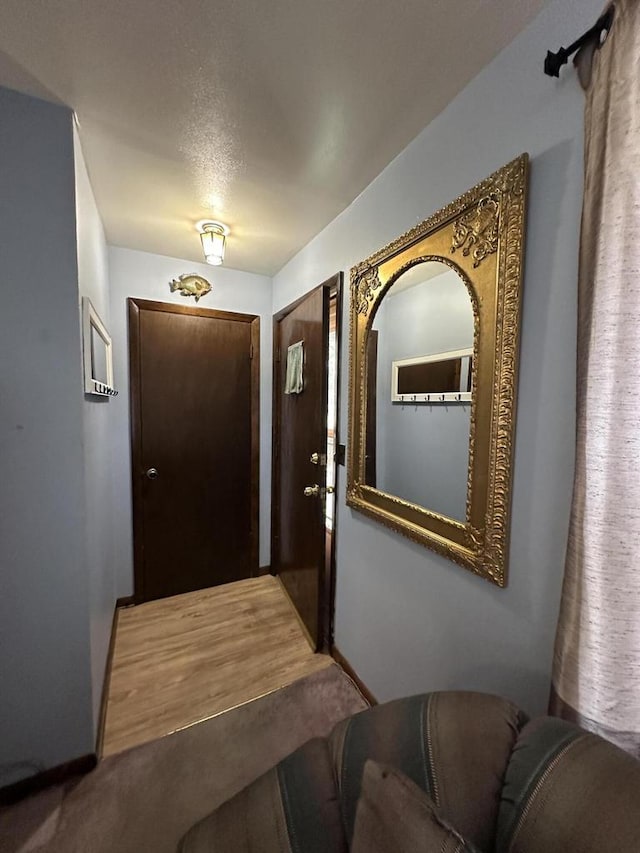 2467 N Bartlett Ave Unit 2467A, Milwaukee, WI 53211 - doorway featuring carpet floors and baseboards