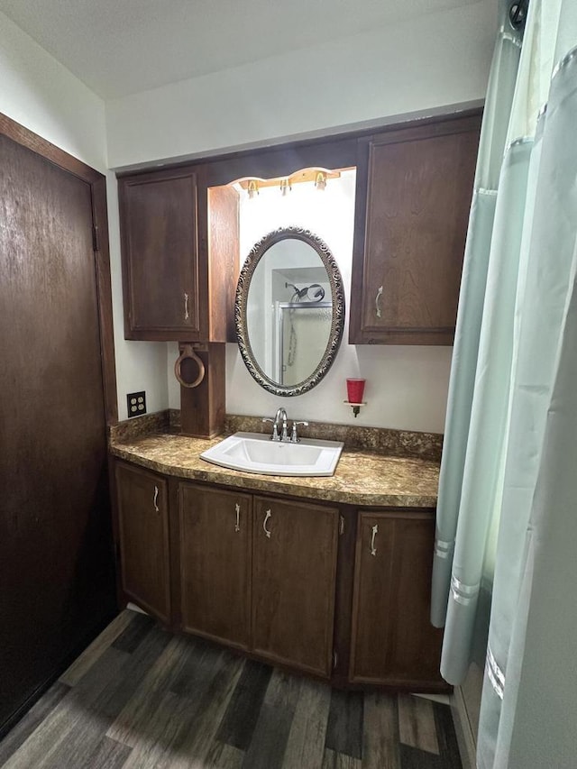 2467 N Bartlett Ave Unit 2467A, Milwaukee, WI 53211 - full bath with wood finished floors and vanity