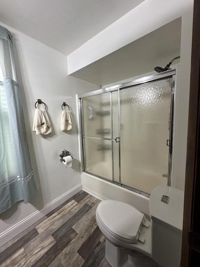 2467 N Bartlett Ave Unit 2467A, Milwaukee, WI 53211 - full bathroom with wood finished floors and shower / bath combination with glass door