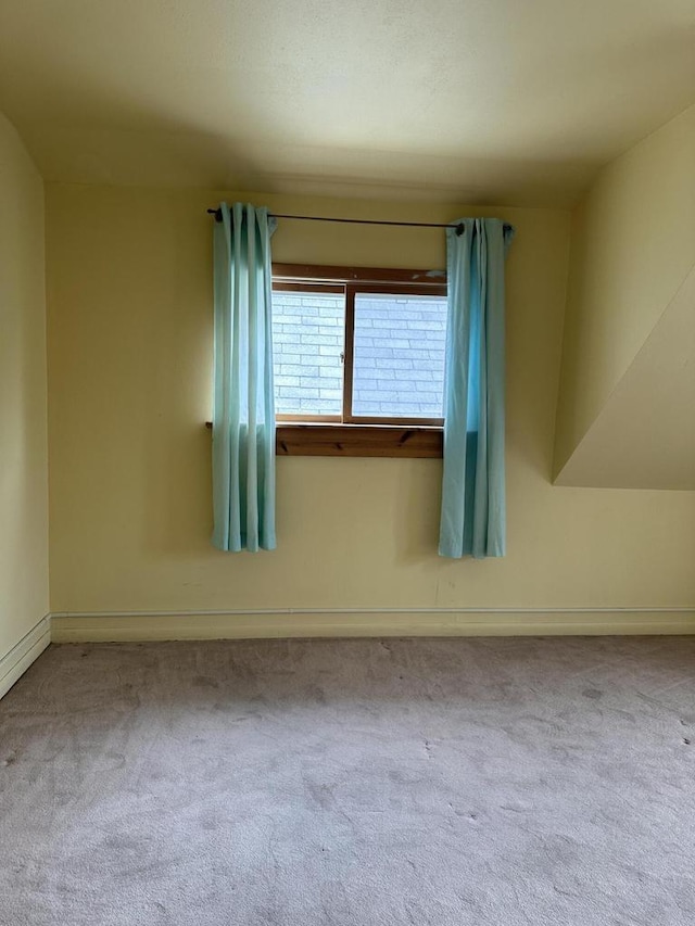 2467 N Bartlett Ave Unit 2467A, Milwaukee, WI 53211 - spare room featuring carpet and baseboards