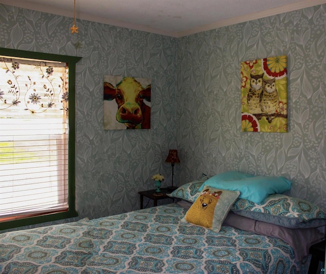 68165 Front St, Iron River, WI 54847 - bedroom featuring ornamental molding and wallpapered walls
