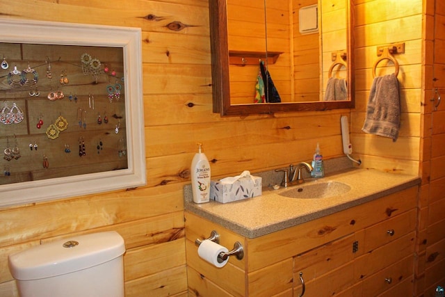 68165 Front St, Iron River, WI 54847 - half bath featuring wood walls and vanity