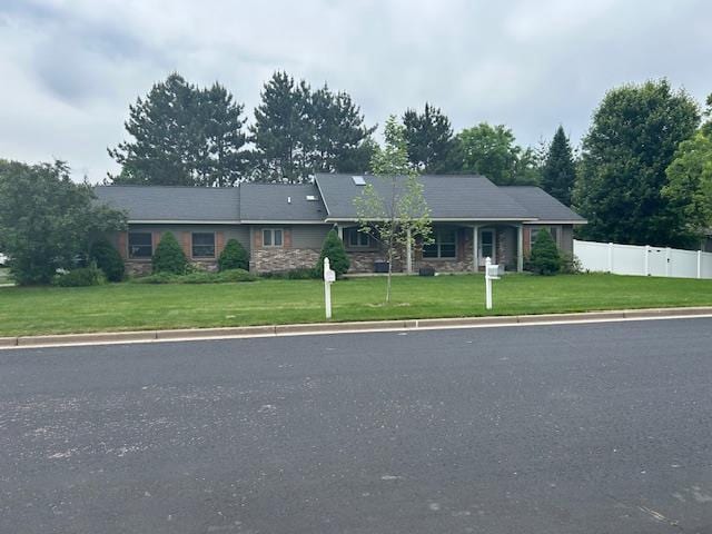 5201 Lombardy Dr, Wausau, WI 54401 - single story home featuring stone siding