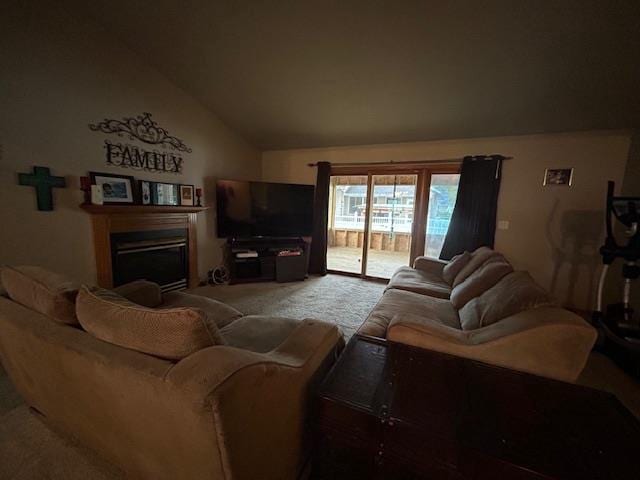 5201 Lombardy Dr, Wausau, WI 54401 - carpeted living area featuring vaulted ceiling and a fireplace