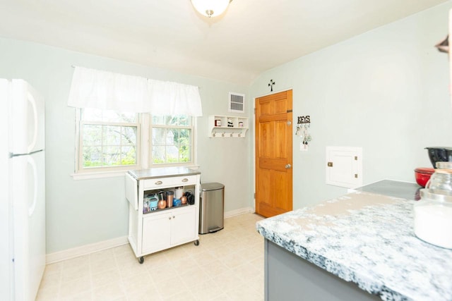 6533 W Center St, Wauwatosa, WI 53210 - bedroom featuring freestanding refrigerator and light flooring