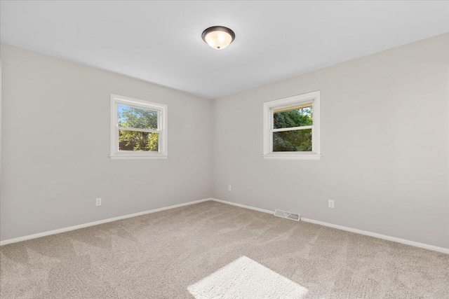 N113W20588 Edgewood Dr, Germantown, WI 53022 - carpeted spare room with baseboards