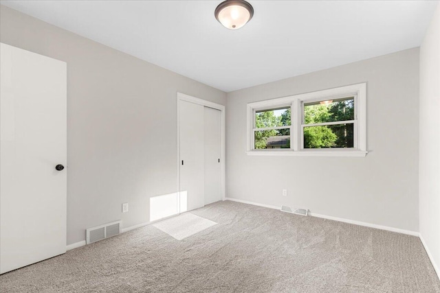 N113W20588 Edgewood Dr, Germantown, WI 53022 - unfurnished bedroom featuring carpet floors and a closet