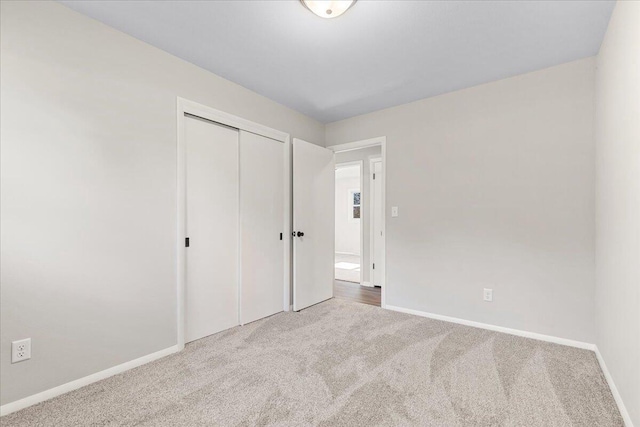 N113W20588 Edgewood Dr, Germantown, WI 53022 - unfurnished bedroom featuring carpet floors and a closet