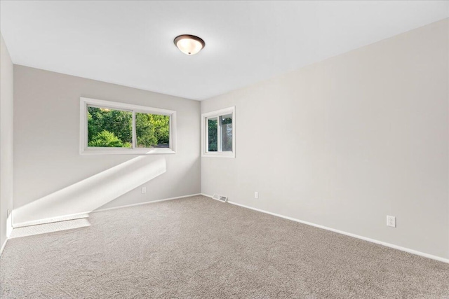 N113W20588 Edgewood Dr, Germantown, WI 53022 - carpeted spare room featuring baseboards