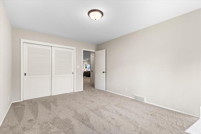 N113W20588 Edgewood Dr, Germantown, WI 53022 - unfurnished bedroom featuring carpet flooring and a closet