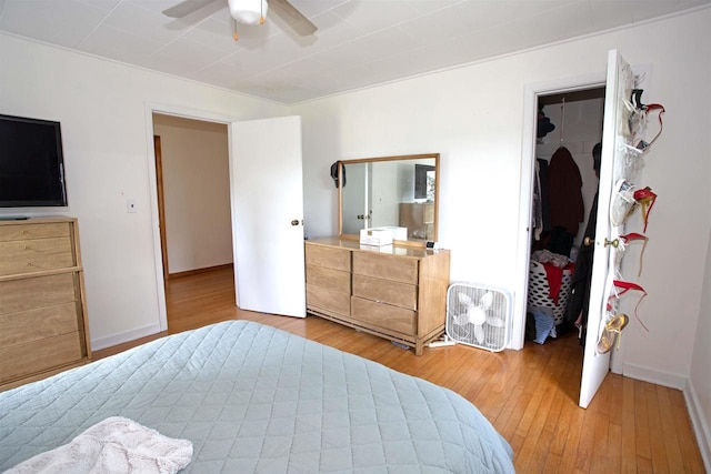 N3225 County Road K, Mauston, WI 53948 - bedroom featuring light wood-type flooring and ceiling fan