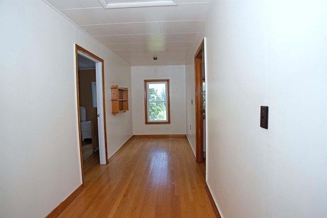 N3225 County Road K, Mauston, WI 53948 - corridor featuring baseboards and light wood finished floors