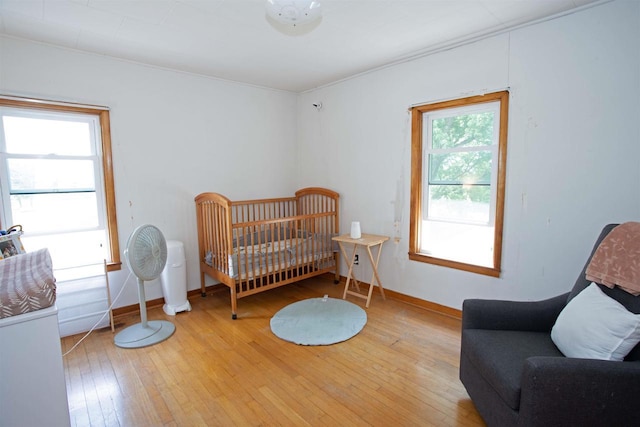 N3225 County Road K, Mauston, WI 53948 - bedroom featuring hardwood / wood-style floors and baseboards