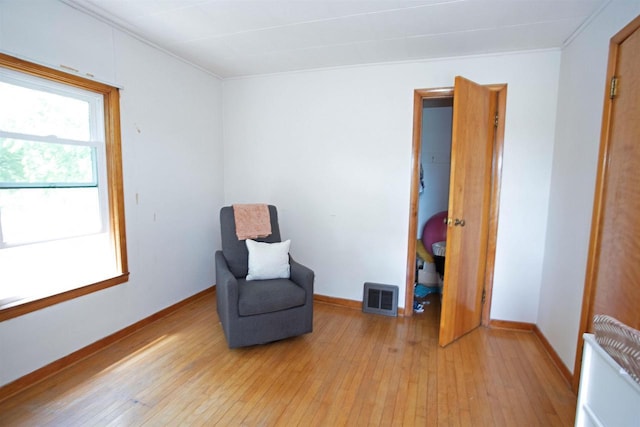 N3225 County Road K, Mauston, WI 53948 - unfurnished room featuring light wood-type flooring and ornamental molding