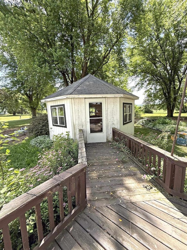 N3225 County Road K, Mauston, WI 53948 - wooden terrace featuring an outbuilding