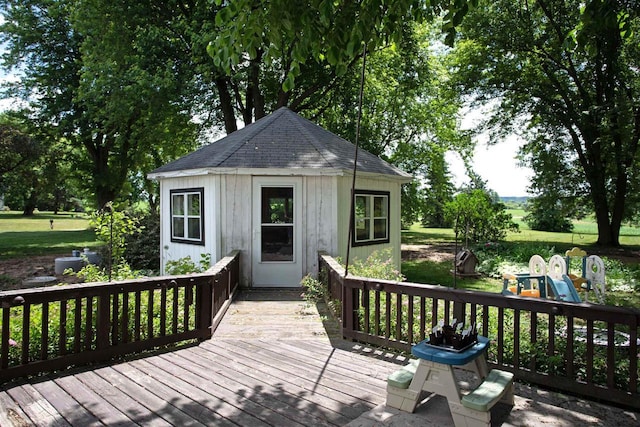 N3225 County Road K, Mauston, WI 53948 - wooden deck featuring an outdoor structure