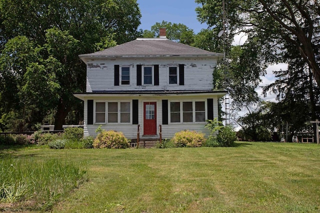 N3225 County Road K, Mauston, WI 53948 - traditional style home with entry steps, a chimney, and a front lawn