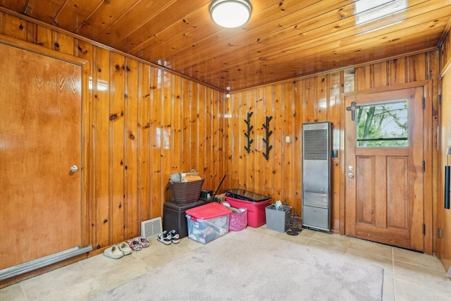 2040 San Fernando Dr, Elm Grove, WI 53122 - tiled foyer with a heating unit, wood ceiling, and wooden walls