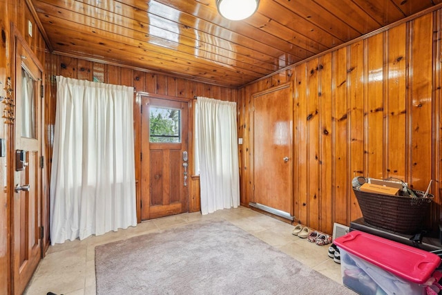 2040 San Fernando Dr, Elm Grove, WI 53122 - entryway with wooden ceiling, wooden walls, and tile patterned floors