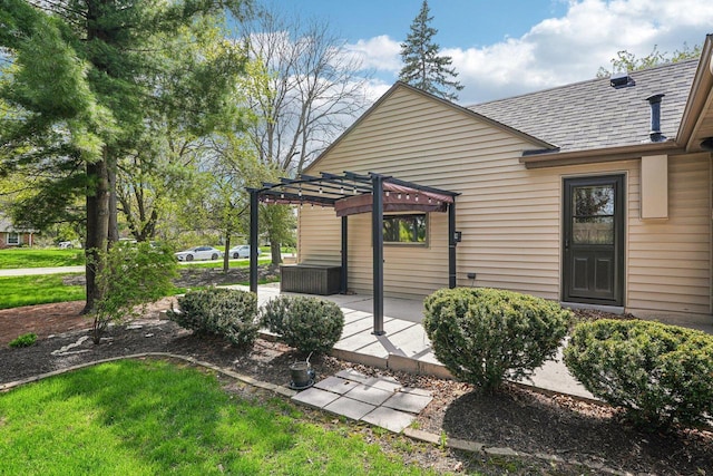 2040 San Fernando Dr, Elm Grove, WI 53122 - back of house with a pergola, a shingled roof, and a patio area