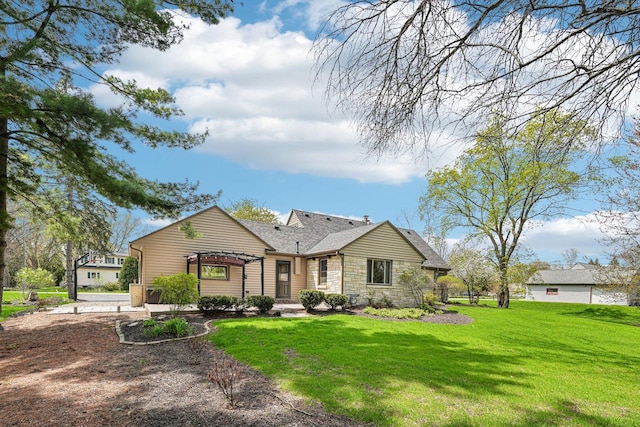 2040 San Fernando Dr, Elm Grove, WI 53122 - ranch-style house with stone siding, a front yard, and a shingled roof