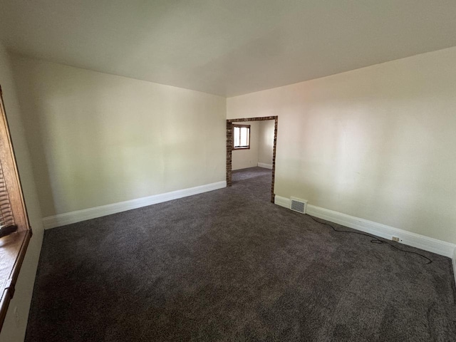 747 S 37th St, Milwaukee, WI 53215 - empty room featuring dark carpet and baseboards