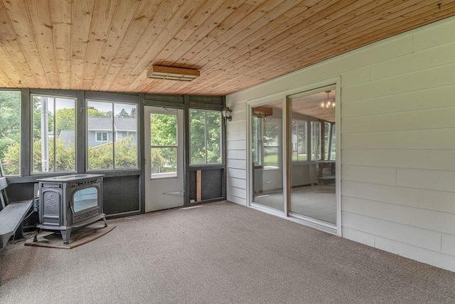 619 4th Ave, New Glarus, WI 53574 - sunroom with plenty of natural light and a wood stove
