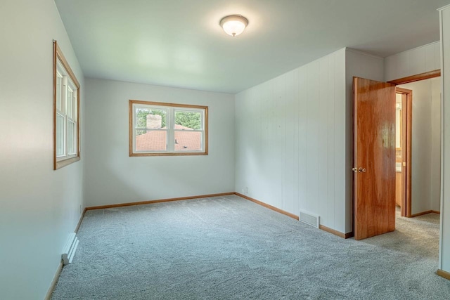 619 4th Ave, New Glarus, WI 53574 - carpeted spare room featuring baseboards