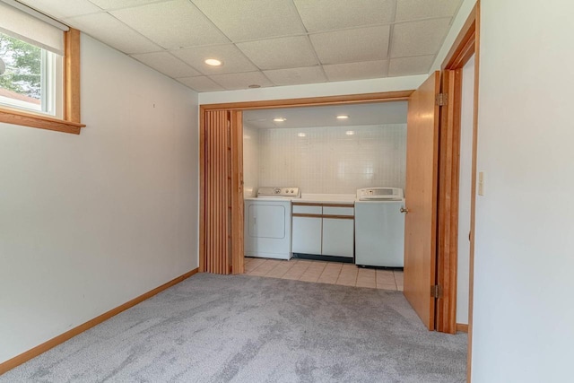 619 4th Ave, New Glarus, WI 53574 - interior space featuring washer / clothes dryer, light carpet, recessed lighting, and light tile patterned floors