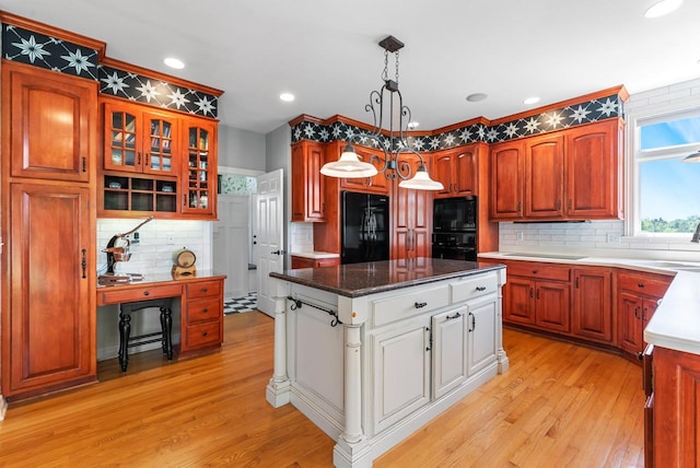 4047 Scenic Rd, Jackson, WI 53037 - kitchen featuring black appliances, tasteful backsplash, a kitchen island, light wood finished floors, and recessed lighting